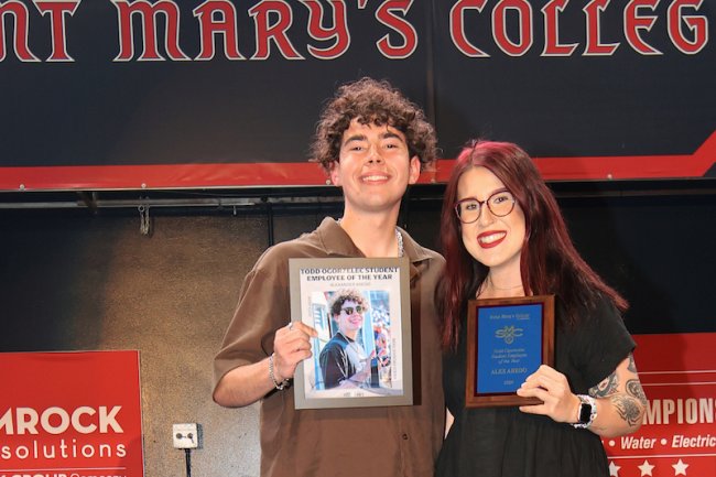 Student Alex Ahedo '25 and Emily Smith '19 hold awards for Ahedo at Gael Awards 2024