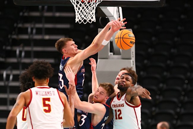 Paulius Murauskas and Luke Barrett defend against USC in November 2024