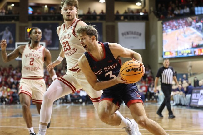 Men's basketball player Augustas Marciulionis drives against Nebraska on November 17, 2024