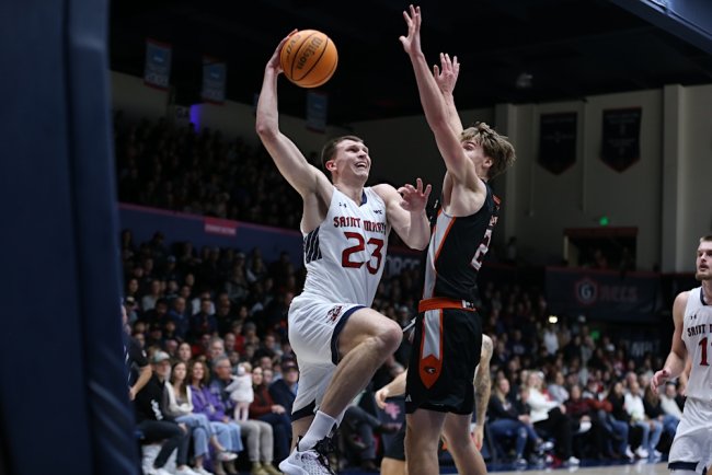 Men's basketball player Paulius Murauskas shoots against Pacific in December 2024