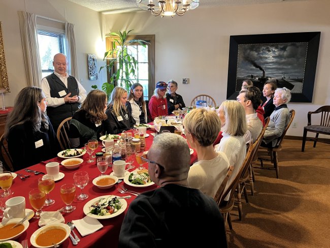 Br. Charles Hilken hosts a group of SMC community members at a recent Soup &amp; Substance gathering.