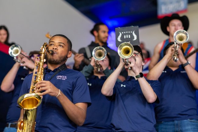 Students in pep band play as SMC men's basketball faces Santa Clara in February 2025