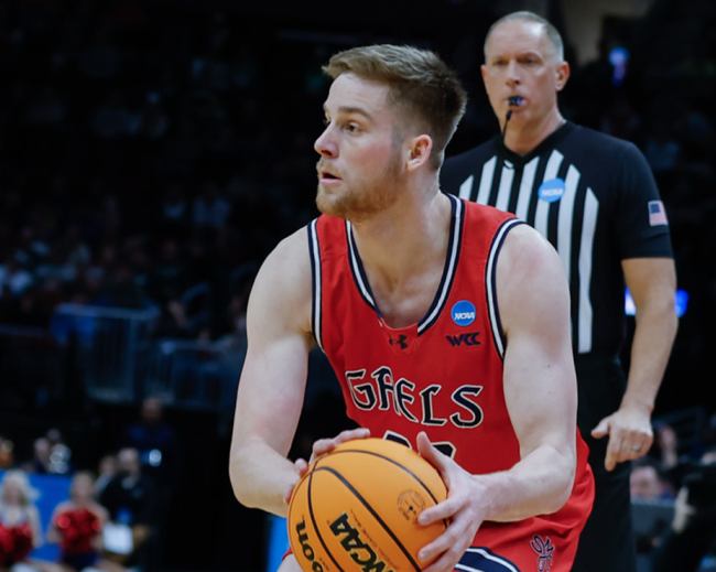 Men's basketball player Luke Barrett prepares to shoot against Alabama in the NCAA Tournament 2025