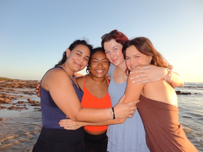 Lexi with friends on the beach