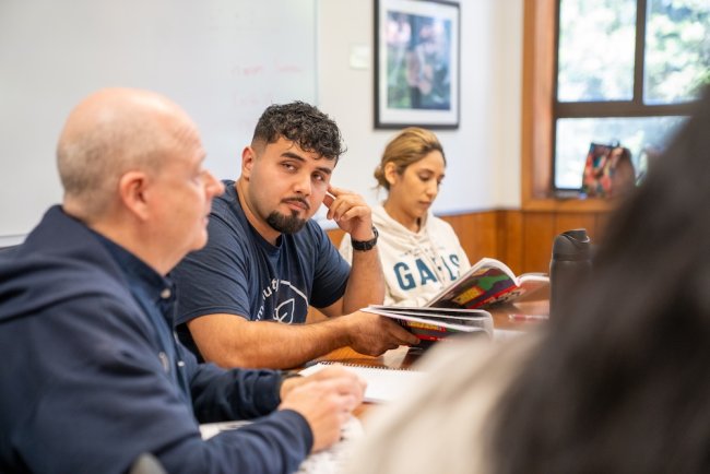 Br. Charles Hilken talking with students in Collegiate Seminar Class in summer 2025