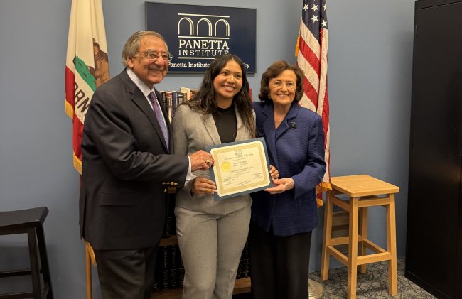 Leon and Sylvia Panetta and Rose Velasquez pose for a photo