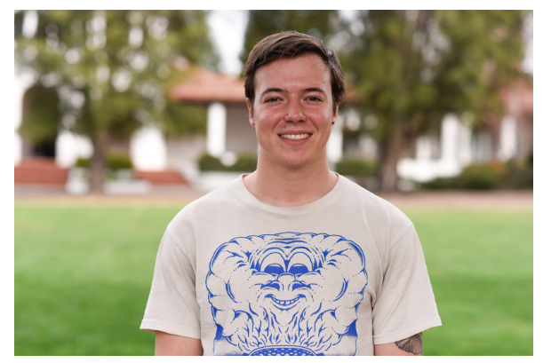 Sam Nobile Writing Studies student class of 2025 on SMC chapel lawn