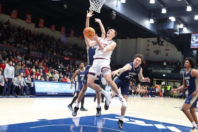 Basketball player Paulius Murauskas shoots against UC Merced in November 2025