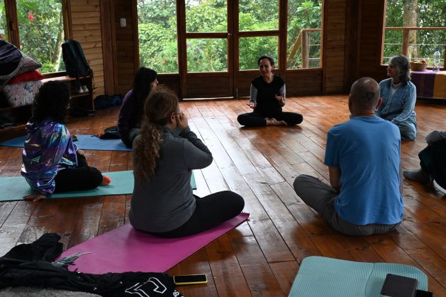 Barragan leading movement exercises in retreat center in Colombia