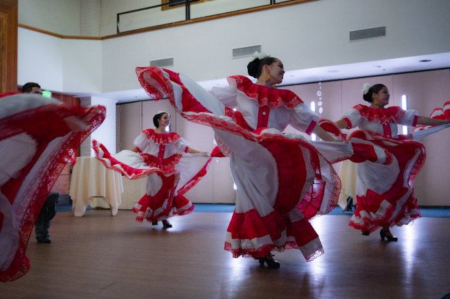 Baile Folklorico Guadalupano pictured mid-dance