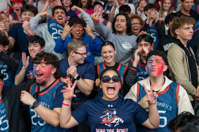 Students cheering in stands in Game against Gonzaga in 2025