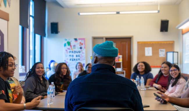 Mahershala Ali speaking to students in a classroom