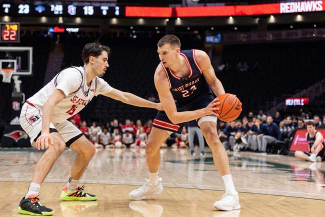 Basketball player Paulius Murauskas drives against Seattle in February 2026