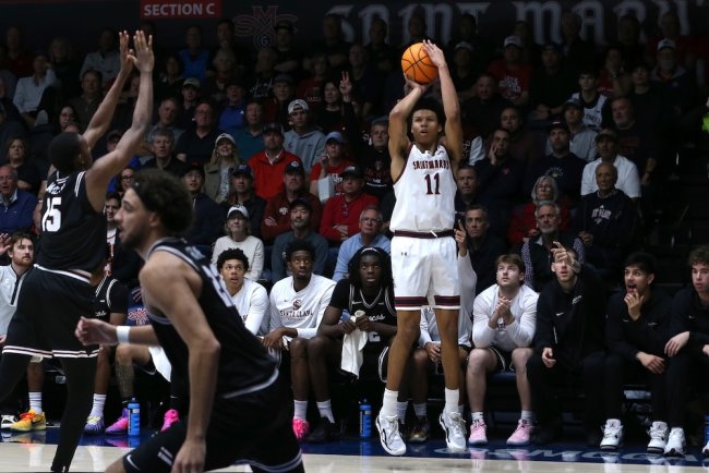 Basketball player Dillan Shaw shoots against Santa Clara in February 2026