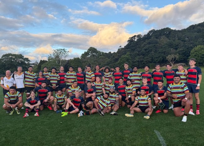 Men's Rugby team with a New Zealand team posing for a group shot in January 2026