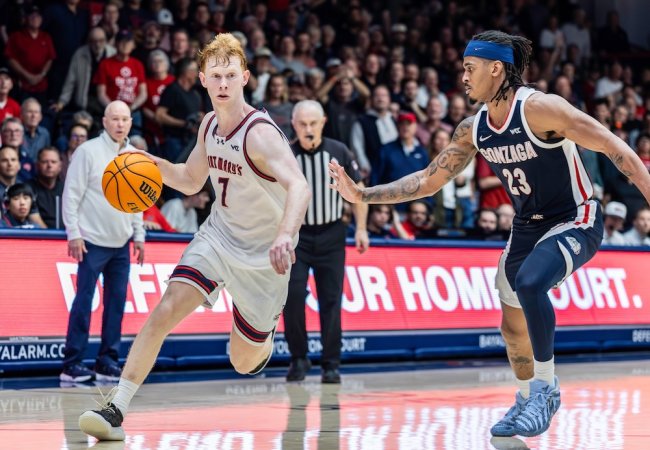 Basketball player Joshua Dent drives against Gonzaga in February 2026