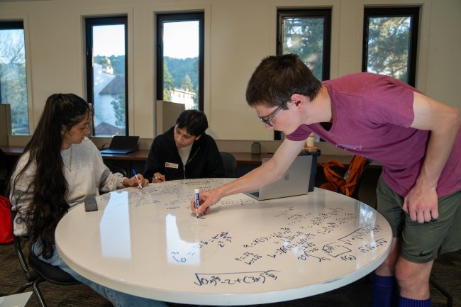 Students in the STEM center studying math