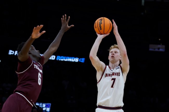 Basketball player Josh Dent shoots against Texas A&amp;M in NCAA Tournament 2026
