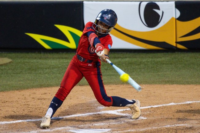 Softball player Camille Lara hits against Oregon in 2026 NCAA Regional