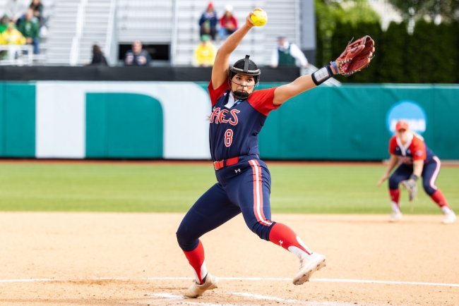 Softball pitcher Odhi Vasquez winding up