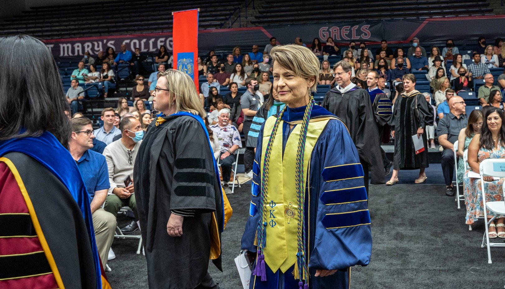 Deans and college officials processing into commencement liturgy