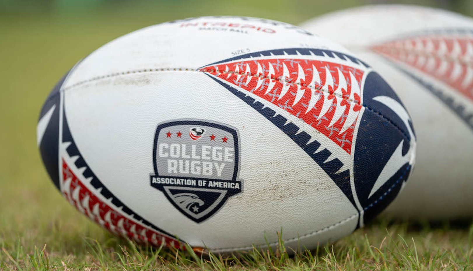 Rugby ball on pitch for 2024 National Championships