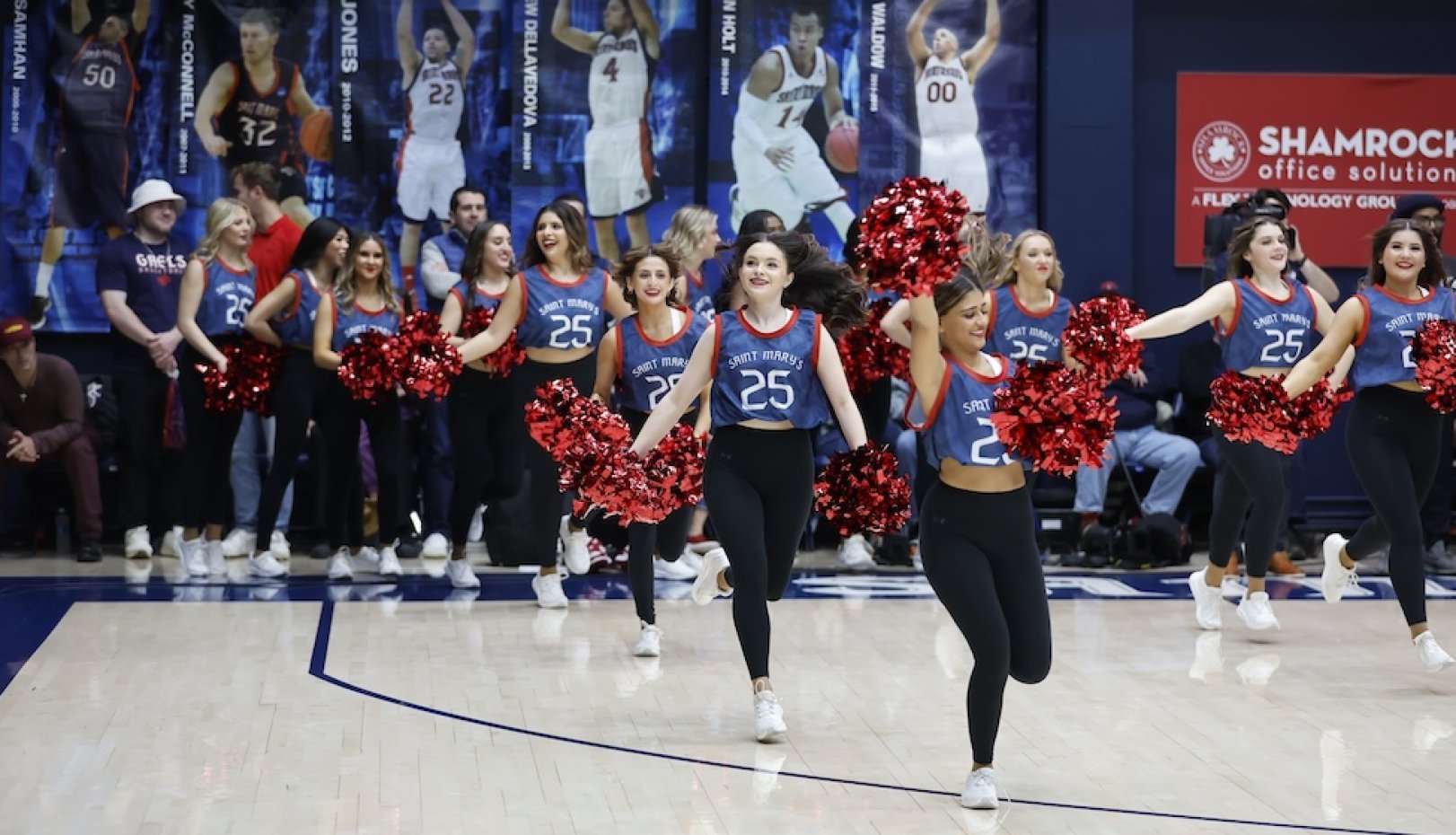 SMC Spirit Team runs onto the court
