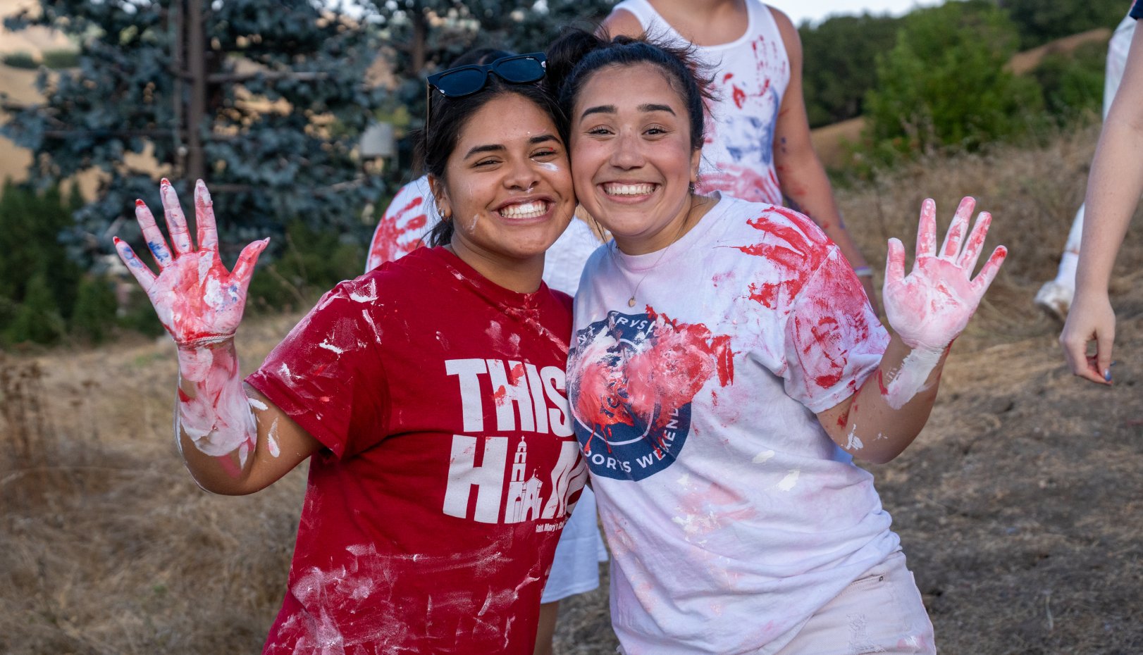 students painting the SMC