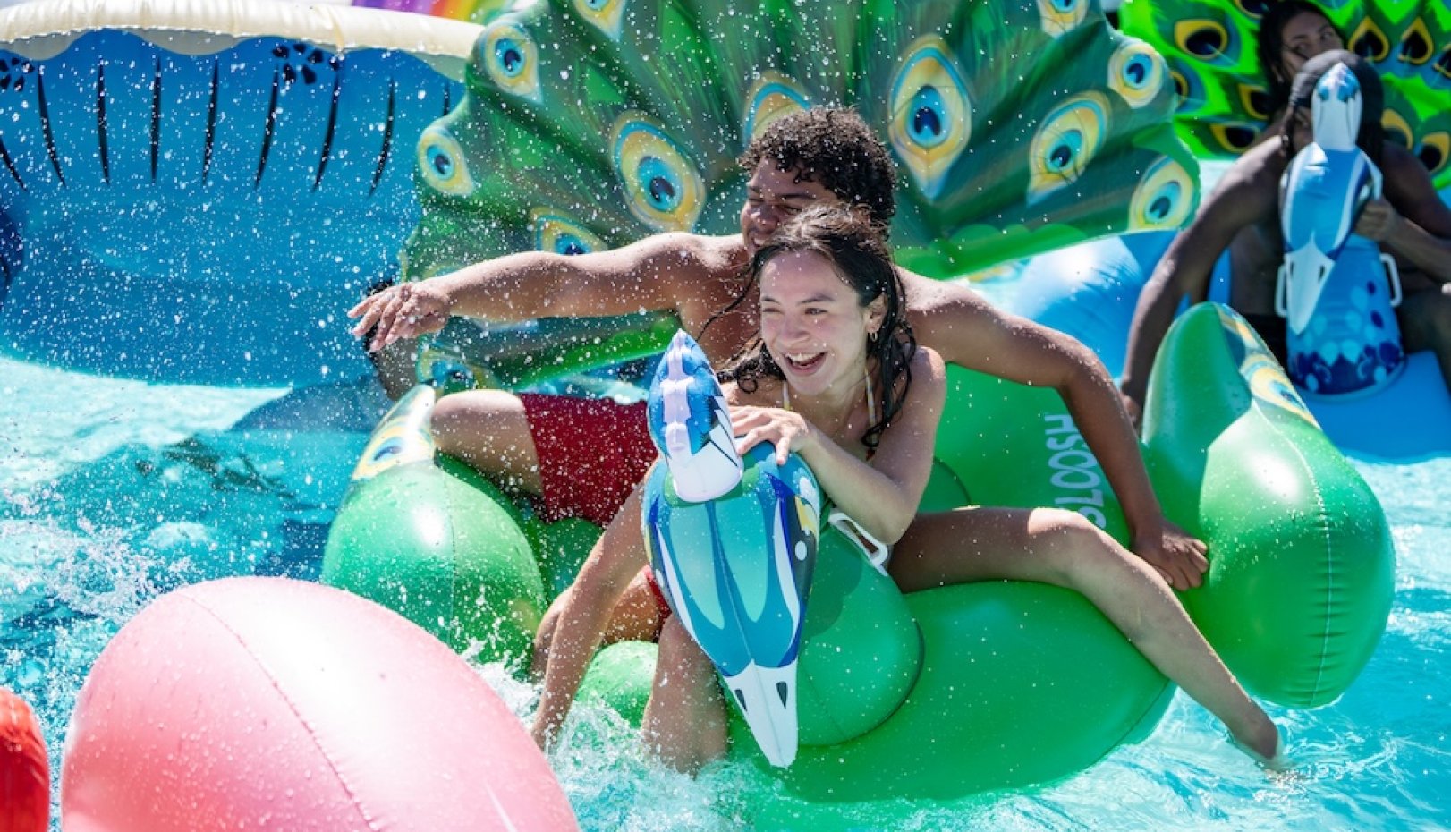 students playing in pool