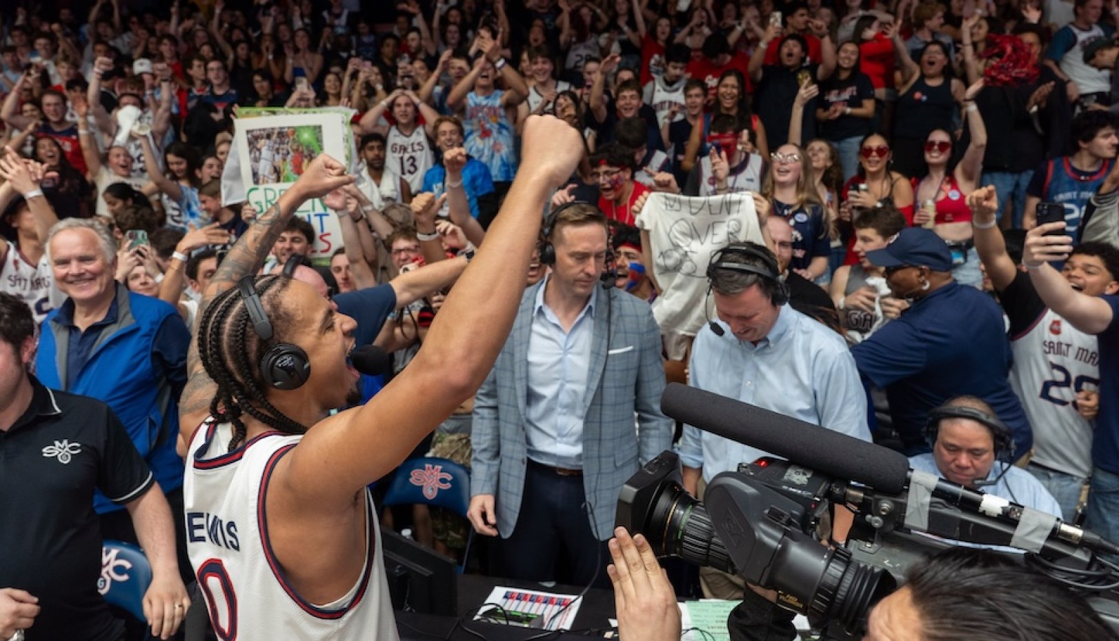 Men's Basketball players celebrate winning WCC Championship in February 2026