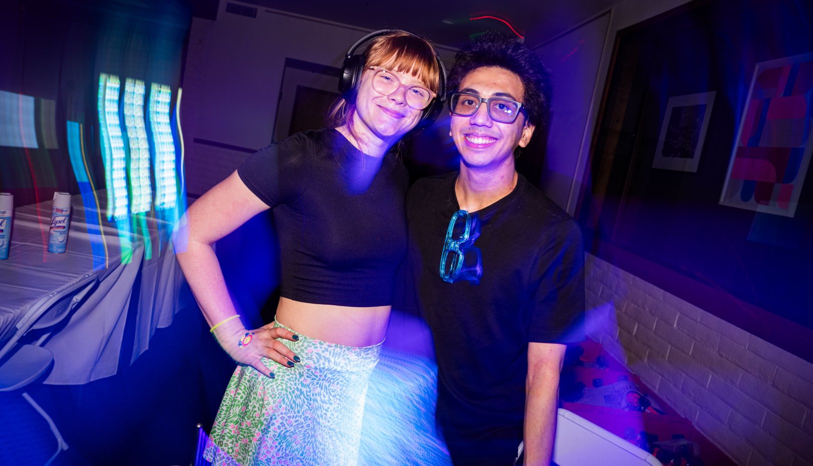 SMC students Shasta Nunes '28 and Matthew Heydari '27 getting lost in the lights at Glow SMC