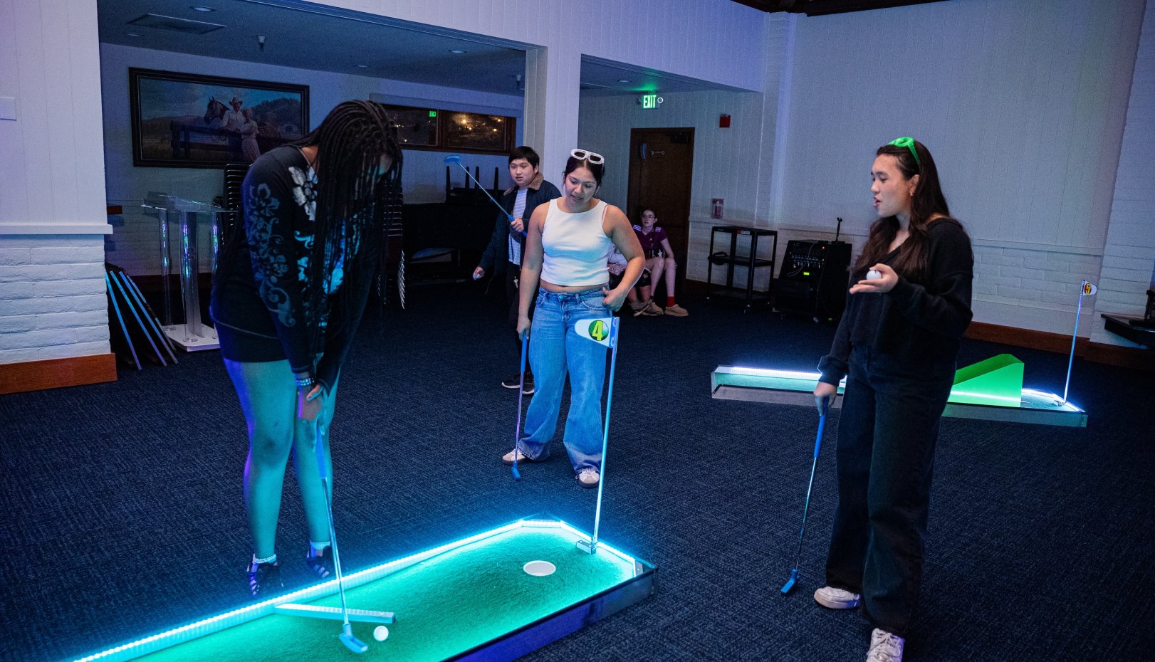 Students Jessica Okwubanego ' 27 and Rose Velasquez '27 enjoying a game of mini golf