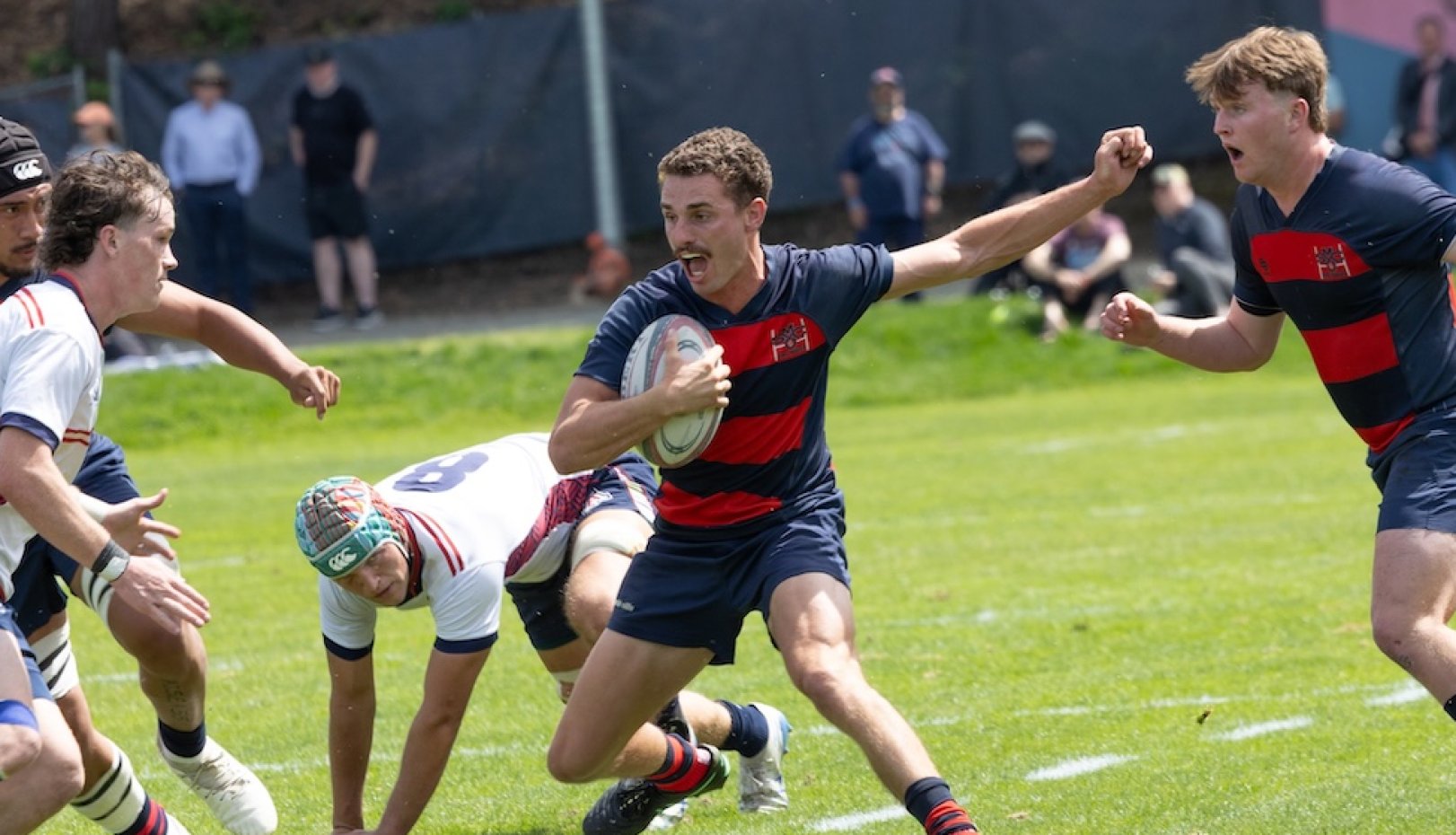 Rugby player Mario Storti runs against Arizona in April 2026