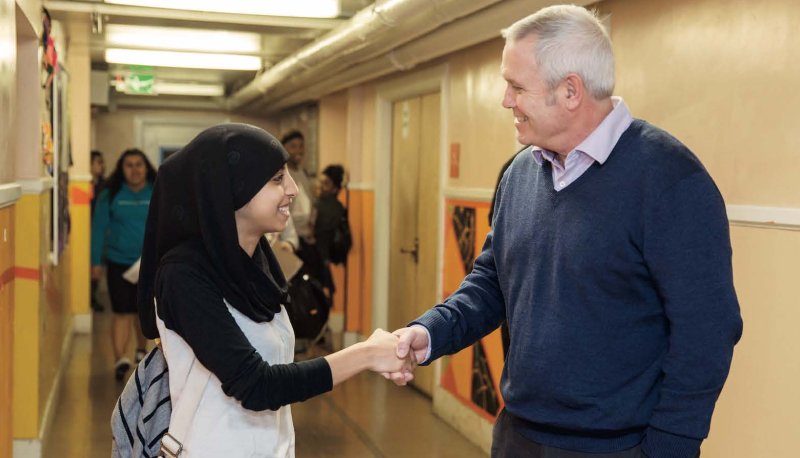 Female student with Bob Lenz of Envision Education