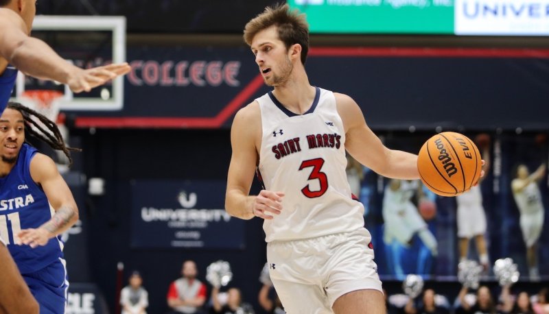Augustus Marciulionis driving to basket