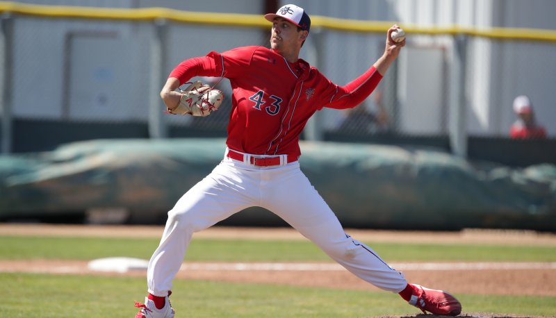 Ky Bush of SMC Baseball throwing a pitch