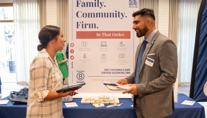a recruiter and student meet at a saint mary's career fair