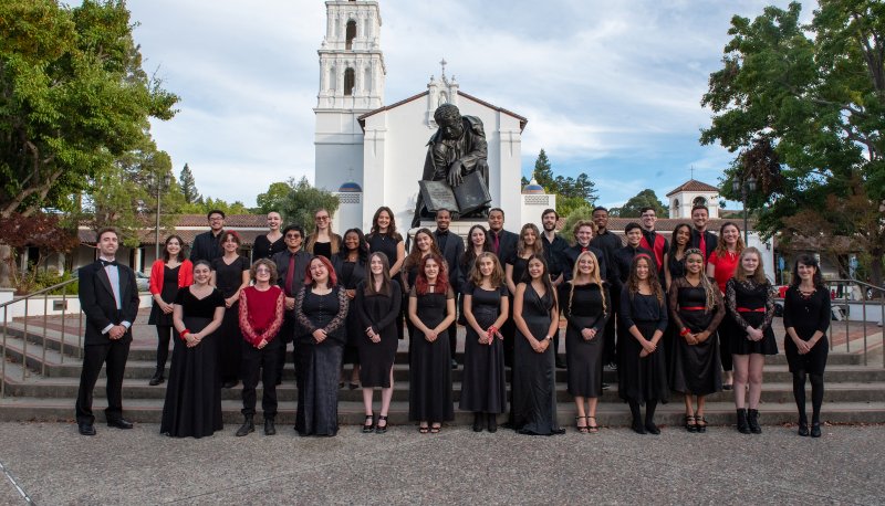 Choir posing in front of SMC chapel