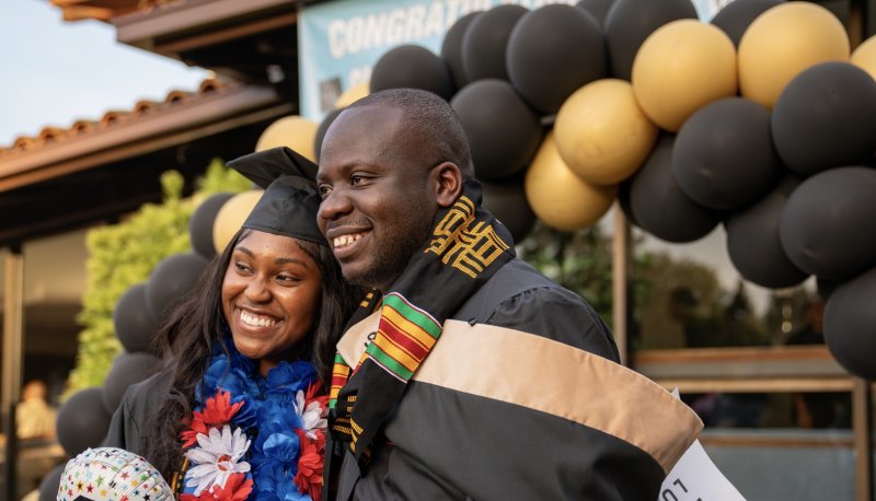 Brian Muganda MS '24 and friend at Black Graduate Celebration 2024