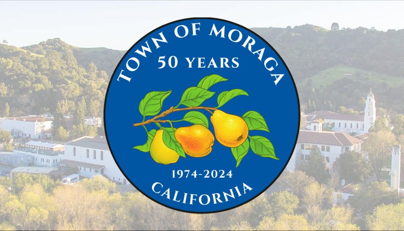 Screened-back image of Saint Mary's campus with 50th Anniversary Town of Moraga Logo in front of it