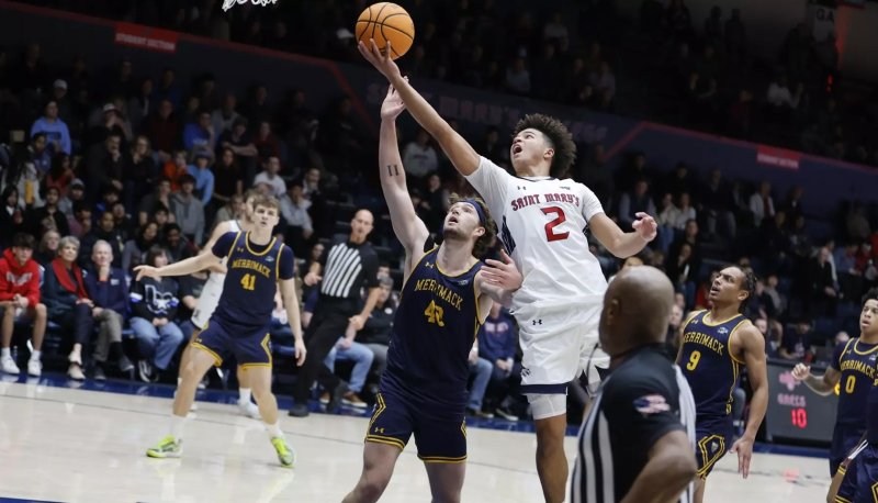 SMC's Jordan Ross driving down the court