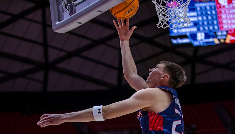 Men's Basketball player Paulius Murauskas shoots against Utah in December 2024