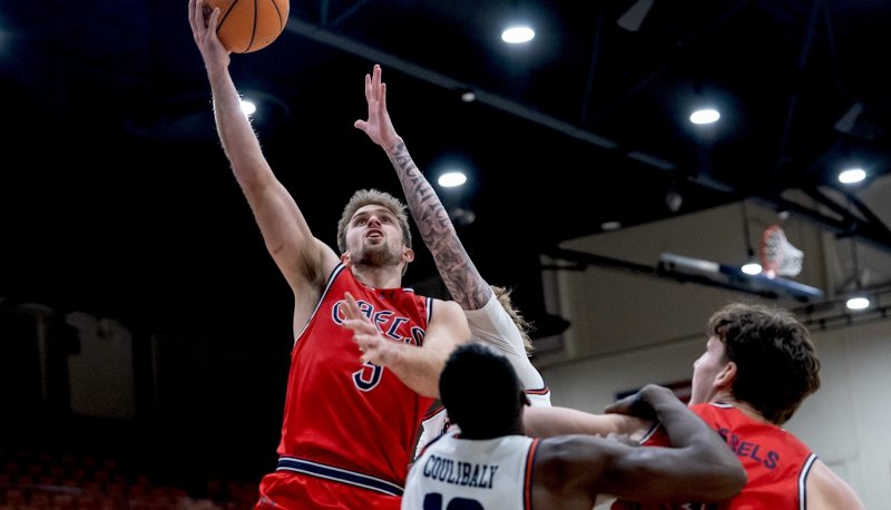 Men's Basketball Player Augustas Marciulionis shoots against Pepperdine on January 18, 2025