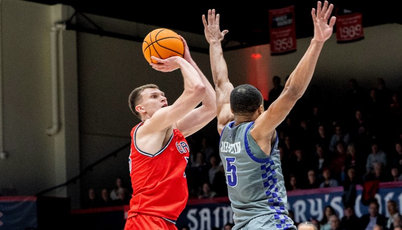 Men's Basketball player Paulius Murauskas shoots against Portland in February 2025