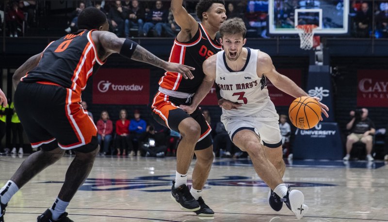Men's Basketball Player Augustas Marciulionis drives against Oregon State in final game of 2025 season