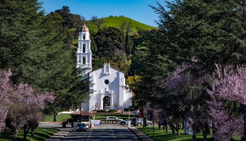 SMC Chapel and fruit trees in bloom in springtime
