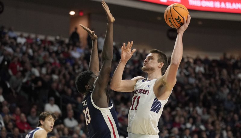 Men's Basketball player Mitchell Saxen shoots against Gonzaga in WCC Tournament Finals on March 11, 2025
