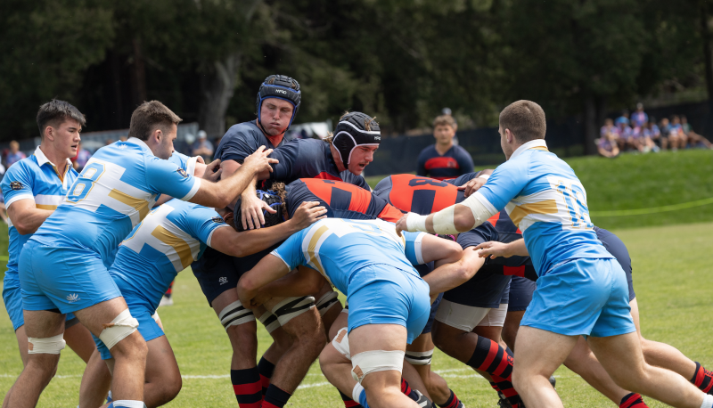 Men's Rugby push the ball forward during a maul