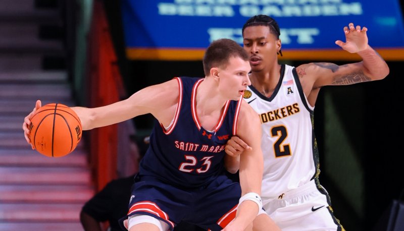 Basketball player Paulius Murauskas drives against Wichita State in November 2025