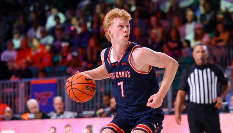 Basketball player Joshua Dent with the ball in fall 2025